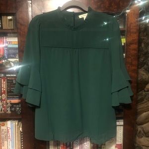 Green high neck ruffle blouse